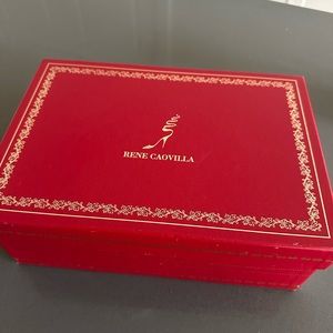 Rene Caovilla
Shimmery Snake-Wrap Stiletto Sandals